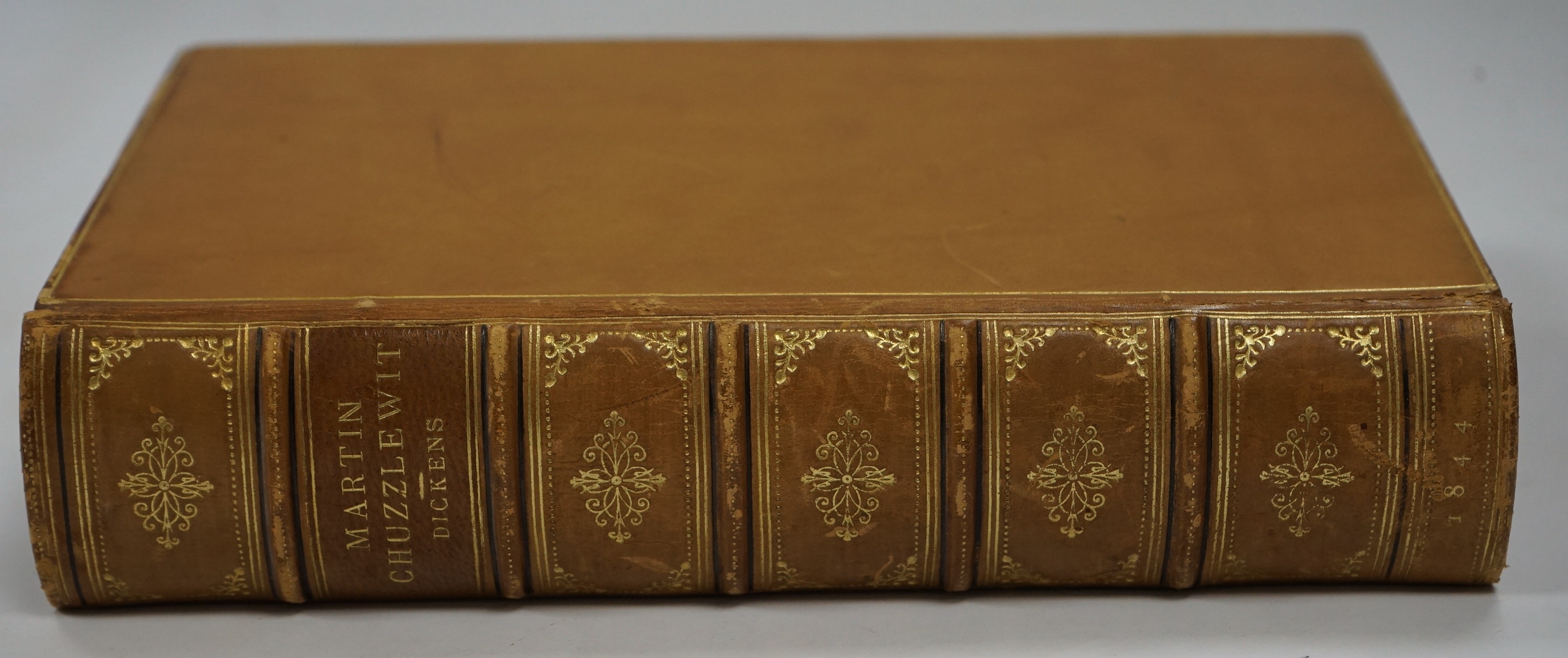 Dickens, Charles - The Life and Adventures of Martin Chuzzlewit. First Edition. engraved pictorial and printed titles, frontis. and 38 plates; earlier 20th cent. gilt ruled polished tan calf, gilt decorated panelled spin